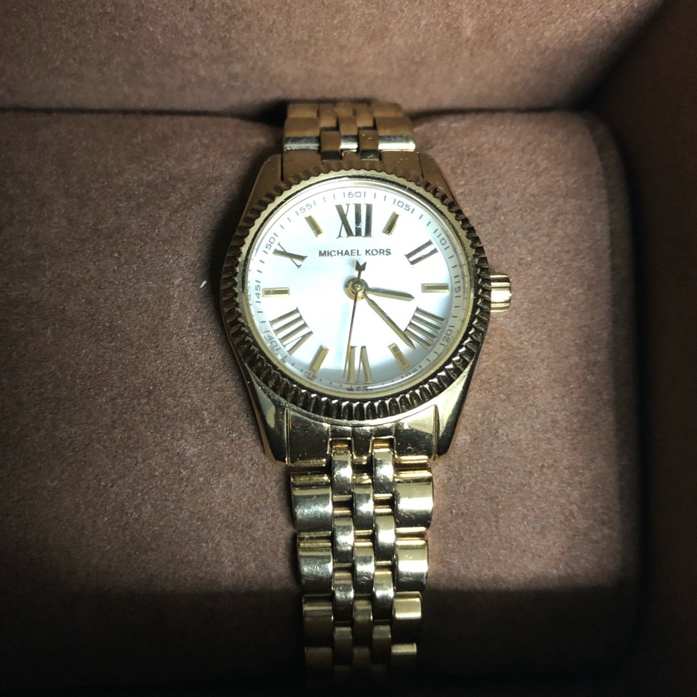 100% Authentic Michael Kors Gold watch.